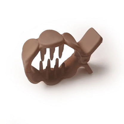 Rund hårklämma i frostad akryl